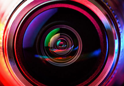 Camera lens with red and blue backlight. Macro photography lenses. Horizontal photography